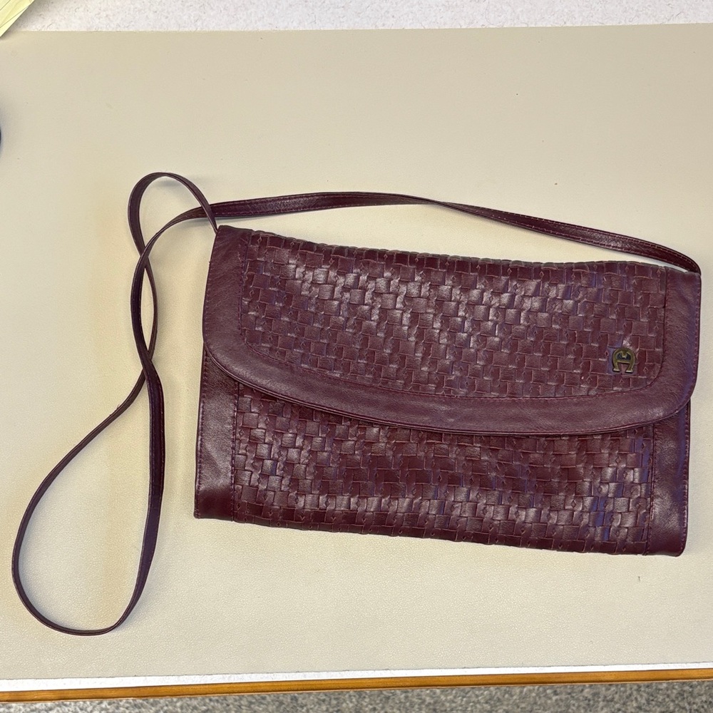 Etienne Aigner Woven Leather Clutch in burgundy oxblood